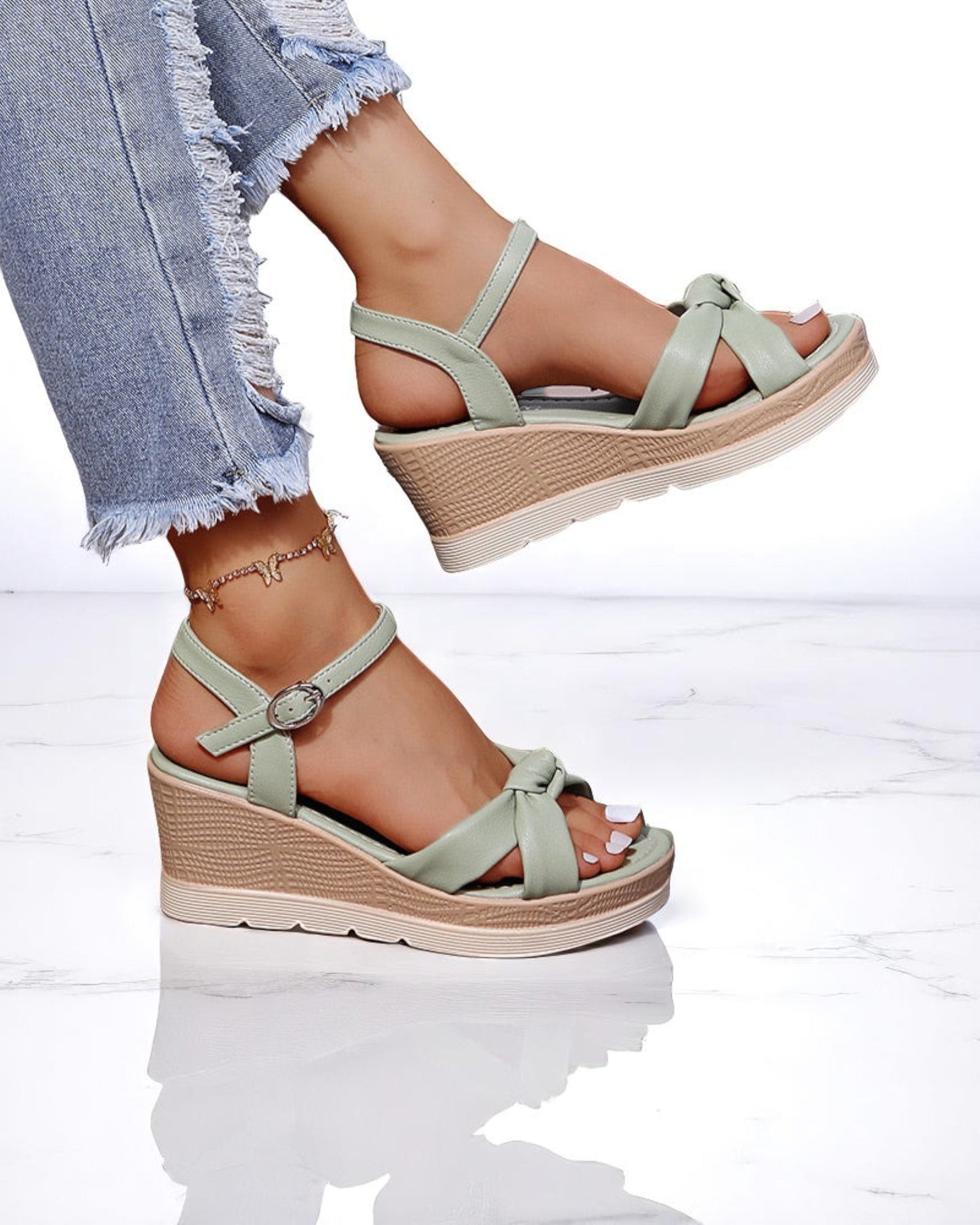Paola Plattformsandalen mit gekreuzten Riemen